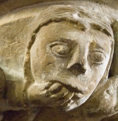 A worried looking carved head!