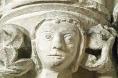 Carved capital of a woman