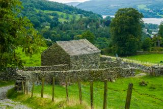 High Sweden Bridge, A stone farm building by the trail