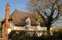 Hitcham, All Saints Church, Thatched cottage near the church