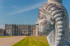 The front facade and Egyptian statue
