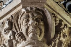 Grotesque head on a nave capital