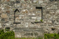Aumbry cupboards in the east wall