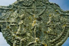 Crucifixion carving on the cross head