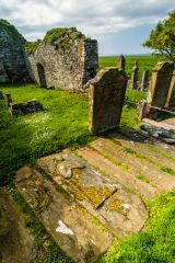 Medieval grave slabs inside the ruined chapel