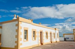 Blockhouse building beside the lighthouse tower