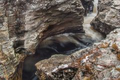 A pool of water below the bridge