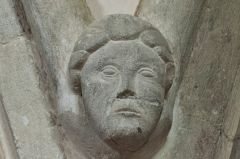 13th century carved head in the nave
