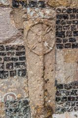 Child's coffin lid, south chapel wall