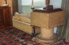 Medieval font and knight's effigy