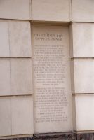 Inscription at the base of the Golden Boy