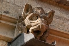 Grotesque gargoyle carving