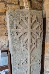 Lyddington, St Andrew Church, Floriated cross grave slab in the church porch