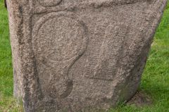 Comb and mirror carvings
