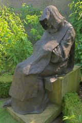 Unusual statues decorate unique garden rooms