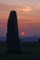 Sunset and standing stone