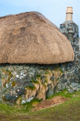 A cottage end wall and chimney