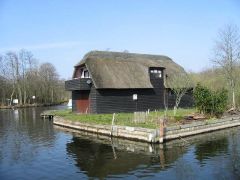 Thatched boathouse, Lymekiln Dyke entrance (c) Nick Smith