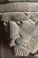 Carved head on a north acade pillar