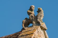 A carved figure on the castle gable