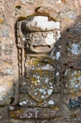 Heraldic carved stone, nave wall