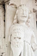 Carved figure flanking the gateway