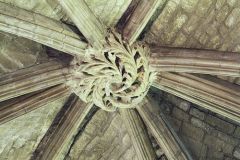 A carved stone roof boss