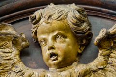 A gilded cherub in the chapel