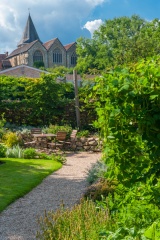 The garden and parish church beyond