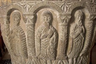 The Norman font inside the church