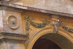 Neo-classical carving on the college gateway