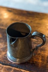 A pewter mug in the parlour