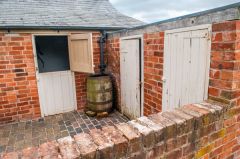 Rosedene, The rear yard, privy, and water butt