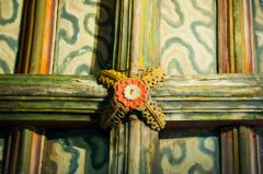 A painted ceiling boss