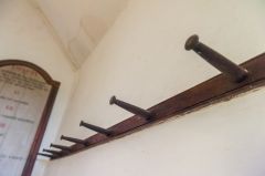 A row of Georgian hat pegs on the wall