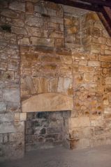 A fireplace in the hall