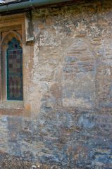 Blocked Norman window, north wall