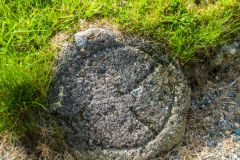 A curious carved stone by the church porch
