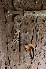 The medieval oak door and iron fittings