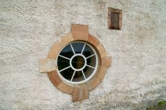 Windows beside the house entrance