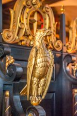 A gilded eagle at the west end of the church