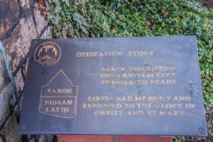The dedication stone information plaque