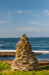 A clifftop cairn