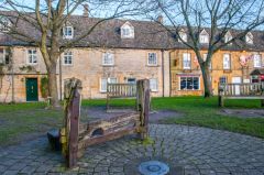 A set of old stocks on the green
