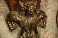 <A grotesque medieval misericord carving