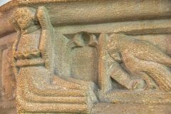 Mermaid carving on the font