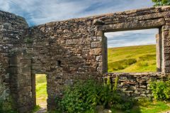 Looking out on open moorland from inside Top Withens