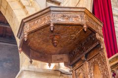 The ornately carved sounding board