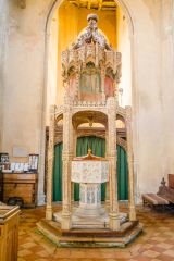 The medieval font canopy in St Botolph's church