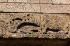 Saxon lintel depicting a boar-hunt